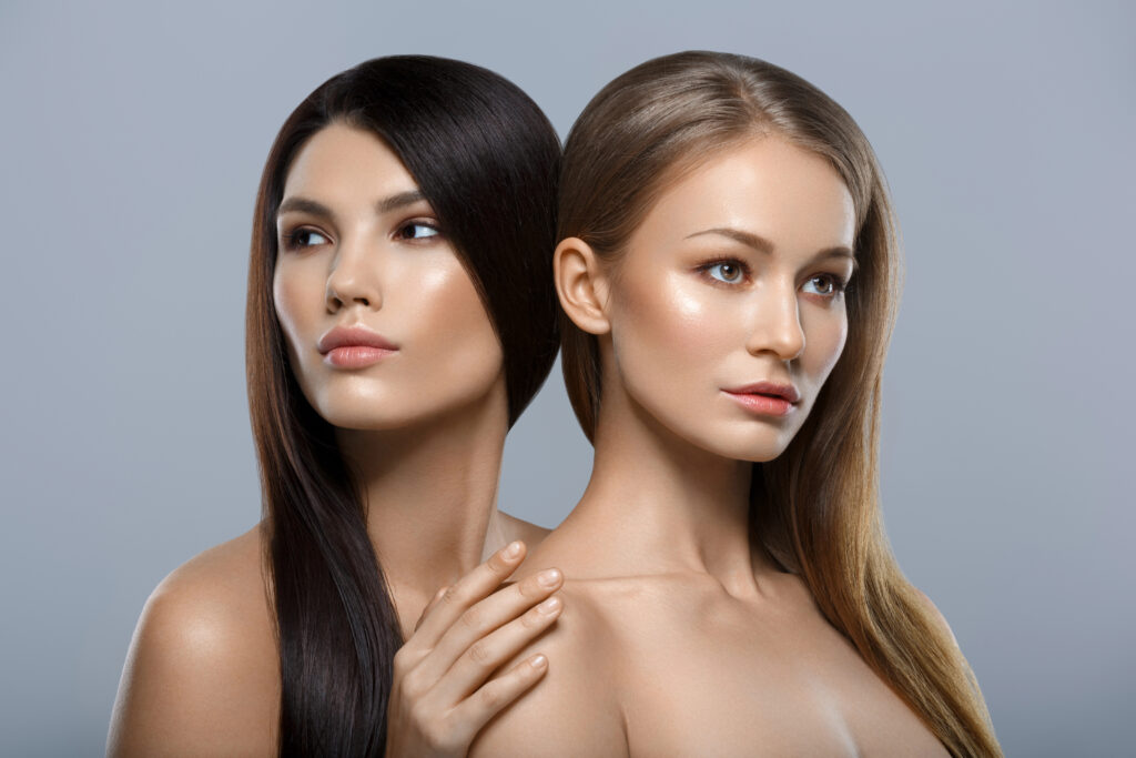 Two women with beautiful skin.