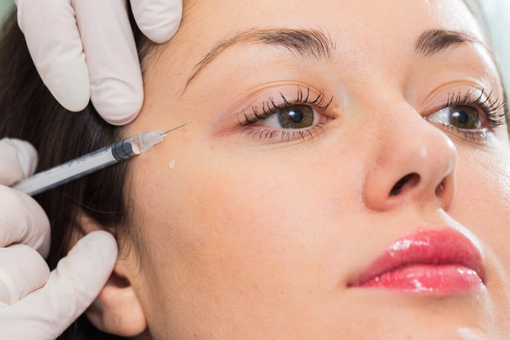 Woman getting botox injection